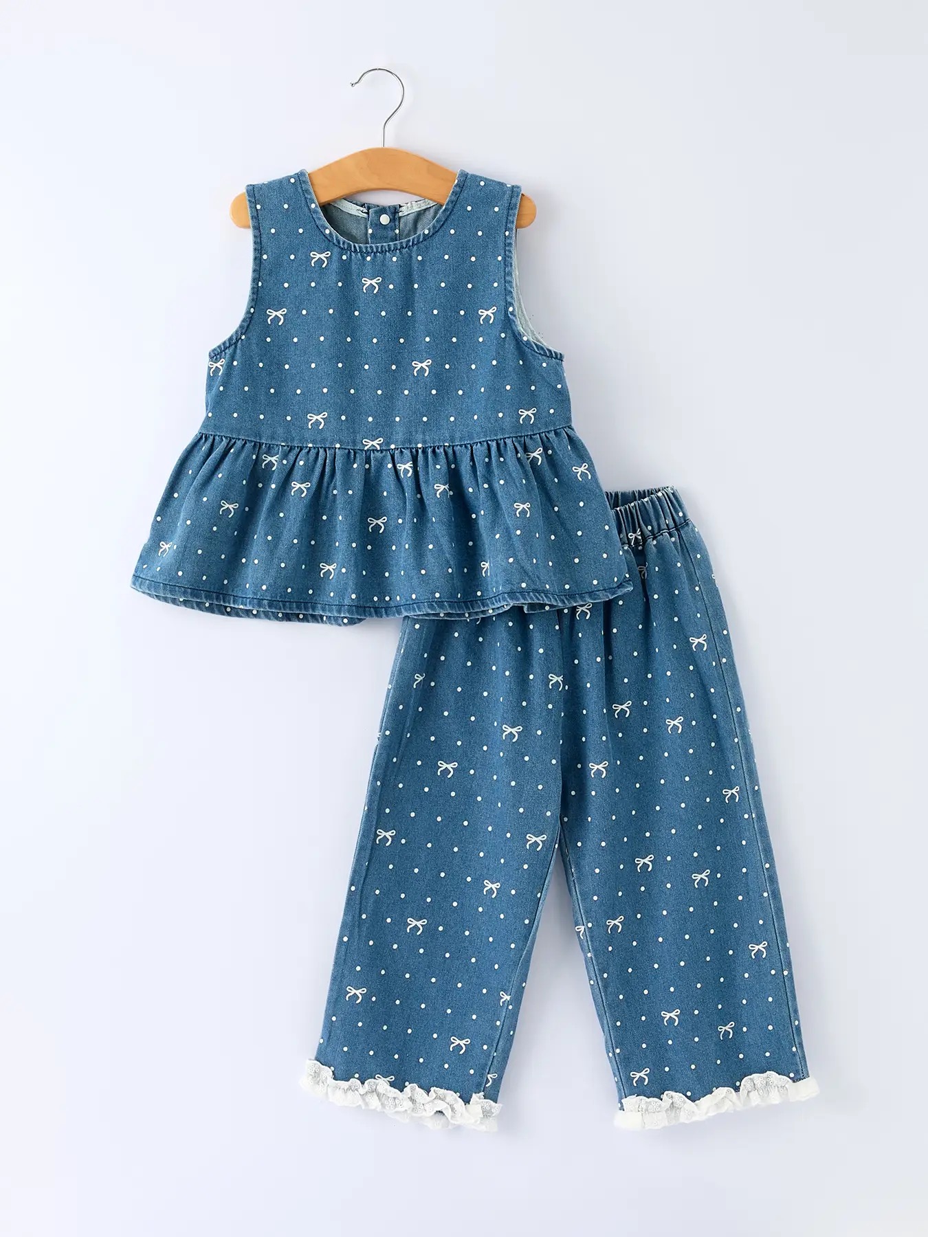 Baby denim peplum top and wide-leg pants set with embroidered bows and polka dots