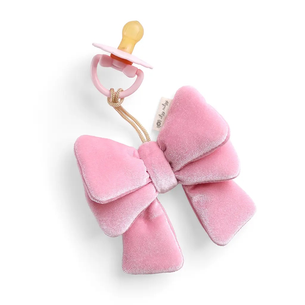 Itzy Ritzy pink velvet bow pacifier clip with attached pacifier