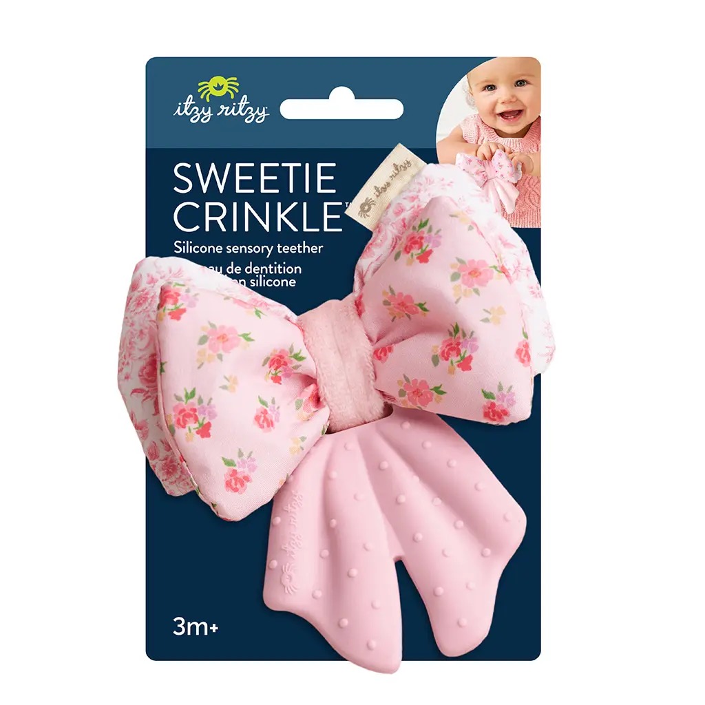 Itzy Ritzy Sweetie Crinkle silicone sensory teether with pink floral bow design
