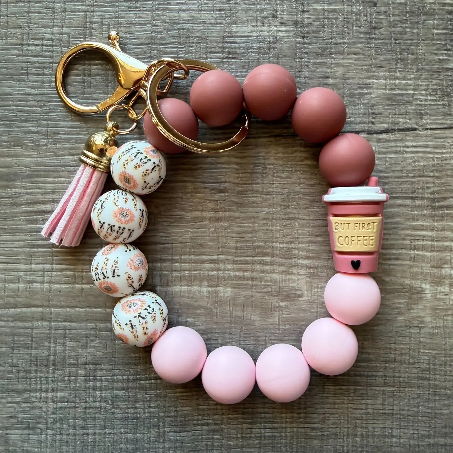 But First Coffee silicone bead wristlet keychain in pink and mauve with floral beads and tassel